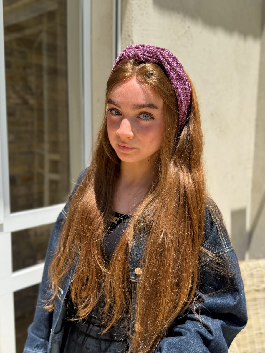 לקוחת תכלייס